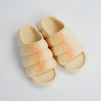 China Eva Cream Bread Slippers Women'S Men'S Home Non-Slip Thick Bottom Casual One Word Slippers for sale