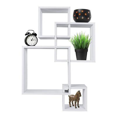 China Adjustable (other) Hot Selling Decorative 4 Cube Intersecting Wall Mounted Floating Shelves Modern Wall Mounted Square Shaped Floating Shelves for sale