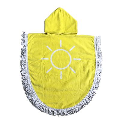 China Custom ODM Eco-Friendly Kids Beach Hooded Tassal Towel Print Cartoon Pattern Beach Bath Poncho Towel For Kids for sale