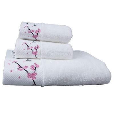 China Viable Gift Towel Sets White 100% Cotton Dobby Design Face Towel Hand Bath Towel With Embroidery Logo for sale