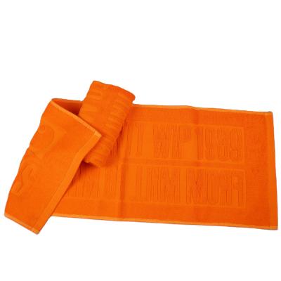 China Custom Towels Eco-friendly Cotton Gym Towel Terry Plain Dyed Hand Towel 30*80cm Solid Orange Jacquard Logo for sale