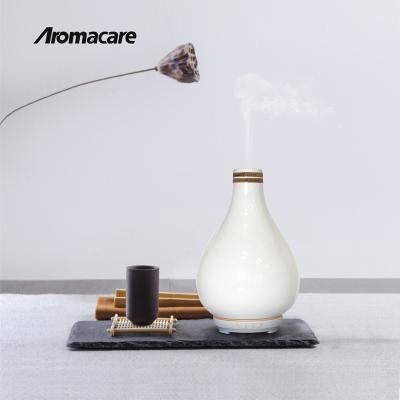 China Portable Ceramic Aromatherapy Air Mist Humidifier 120ML Essential Oil Aroma Diffuser for sale