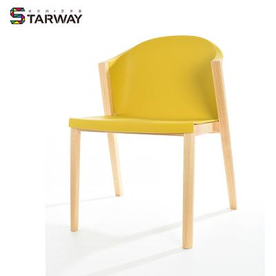 China N/A Wholesale Plastic Dining Chair Modern Chair In Polypropylene Plastic Cafe Chair Wooden Legs for sale