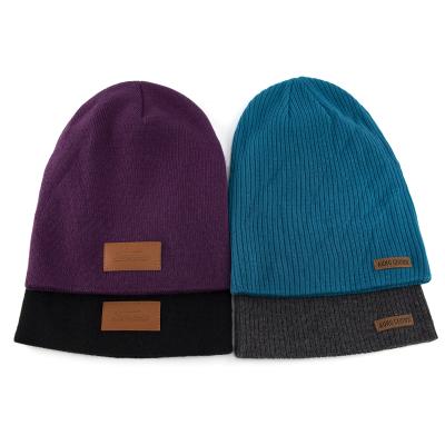 China Direct selling COMMON wholesale promotional custom logo embossed leather patch knit winter unisex hat long beanie hats for sale