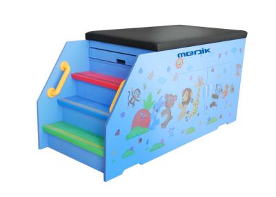 China Cartoon Hospital Pediatric Examination Table Wooden Structure With Cabinet for sale