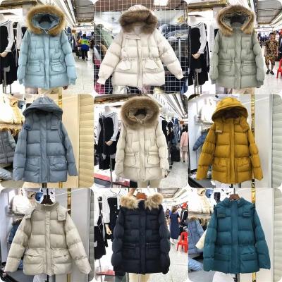 China Breathable Women's Ultralight Down Jacket Long Packable Hooded Puffer Coat Warm for Winter for sale