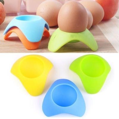 China Viable Egg Cup Silicone Egg Holder Tray Eggs Cooker Kitchen Accessory for sale