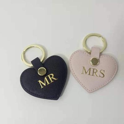 China Custom Leather Heart Shape PU Couples Logo Leather Personalized Key Chain for sale