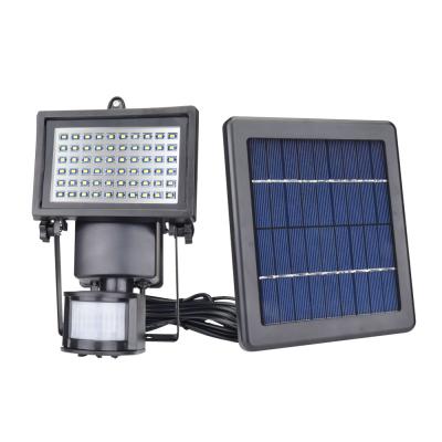 China Garden IP65 60 Led Motion Sensor Garden Led Lawn Lamp Solar Powered Flood Light For Outdoor Lighting Wall Mount for sale