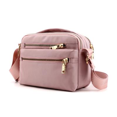 China 2022 New Design Hot Sale Fashion Large Capacity Messenger Bags Solid Color Nylon Women's Shoulder Lady Bags Handbags for sale