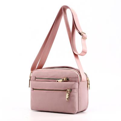 China 2022 new fashion design high quality custom large capacity messenger bags solid color nylon women's shoulder lady bags handbags for sale