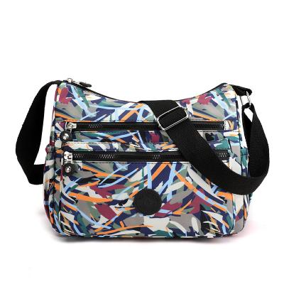 China Custom 2022 Fashion Pattern Ladies Nylon Waterproof Shoulder Zipper Bag Women's Special Design Large Capacity Messenger Bags for sale