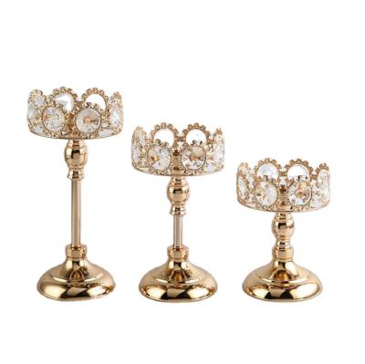 China Amazon Antique Imitation Top Selling Brass Candle Holders Plated Gold Metal Candle Holder Crystal Gold For Wedding Dining Party for sale