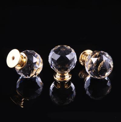 China Amazon Modern Shopping Round Crystal Glass Sideboard Handles And Knobs With Gold Base for sale