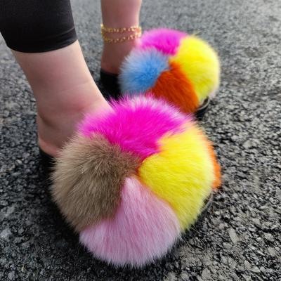 China New Designs PVC Rainbow Colors Fox Block Natural Color Raccoon Fur Slides Unique Multi Anti-skid Fur Slippers For Girls for sale