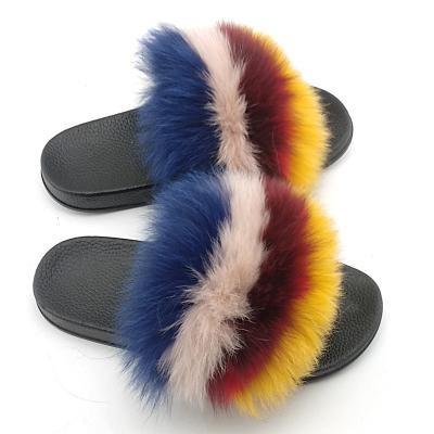 China Large real fluffy furry toddler fox fur slides mummy raccoon fox pom pom ball custom color anti-skid and kids real fur slides for sale