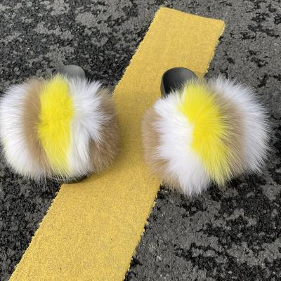 China Women's Natural Fur Real Mid Fluffy Slippers Wholesale Anti-skid Fur Slides Sandals With Thick Fur for sale