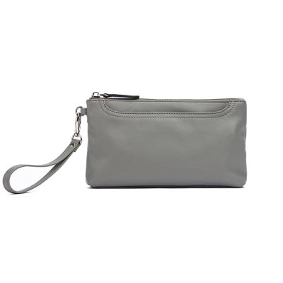 China Fashion Gionar Slim Pouch Customized LOGO Women Genuine Leather Gray Color Purse And Clutch Bag With Strap for sale