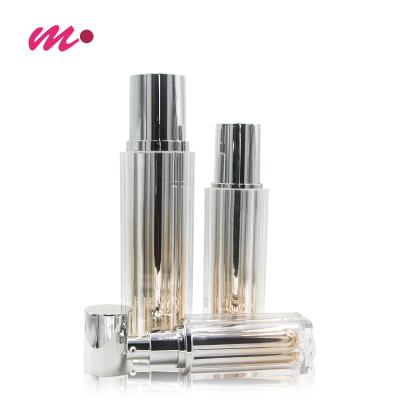 China Custom Logo 40ml 50ml 100ml Gold Acrylic Hexagon Cosmetic Lotion Bottle With Silver Pump Head for sale