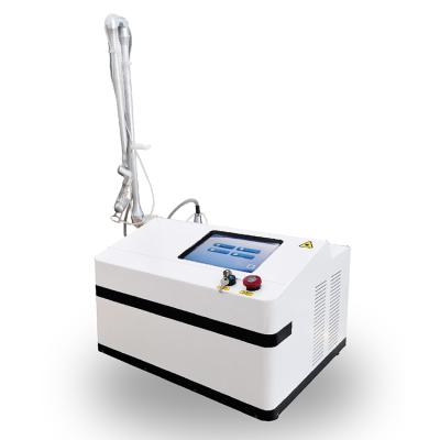 China Acne Treatment 2021 Portable CO2 Laser Machine Equipment Partial CO2 Laser Acne Removal Skin Rejuvenation for sale