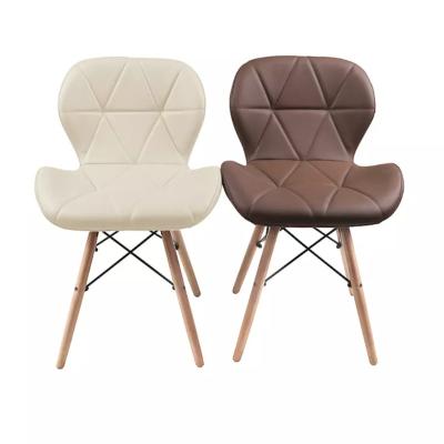 China Foldable Nordic style  white Soft leather dining chairs  wooden legs dinning chair for sale