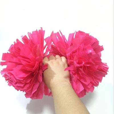 China Solid Color 6 Inch Wet Look Plastic Neon Pink Cheerleader Pom Poms for sale