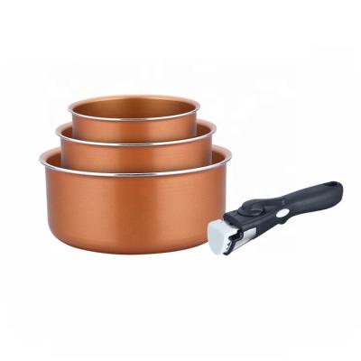 China Sustainable Detachable Aluminum Non-Stick Handle Copper Color Sauce Pot And Cassers for sale