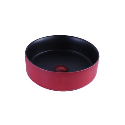 China Easy Clean Ceramic Round Wash Basin Art Luxury Color Bathroom Sinks Wash Basin for sale