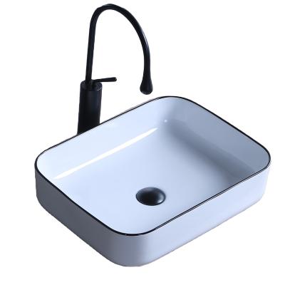 China Easy Clean Bathroom Ceramincs High Quality Sink With Black Drawing Basin for sale