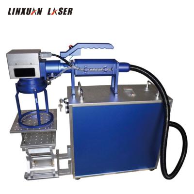 China Laser Marking Separate Handheld 20w Fiber Laser Marking Machine For Metal Toy Guns for sale