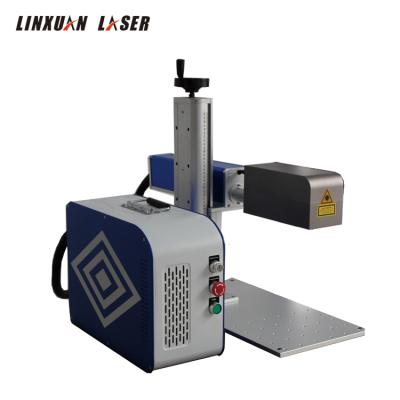 China Laser fiber laser marking machine raycus laser source laser marking engraving machine with rotary vase for sale