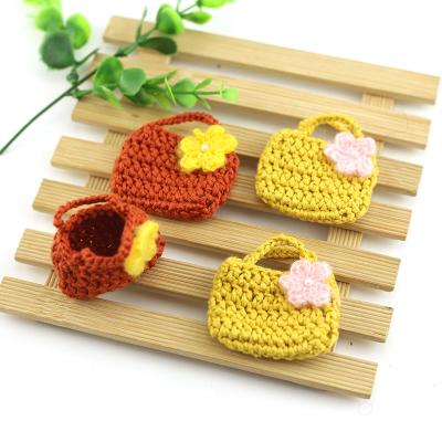 China Mini Handmade Crochet Hook 3D Handbag Small Bag with Crochet Flower Decoration for Clothing Hair Clip Key Charm DIY Accessories for sale