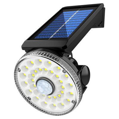 China Outdoor Waterproof 32 LED Solar Cell Sensor Security Solar Powered Motion Activated Wireless Lights Garden Lights Outside Wall Lamp for sale