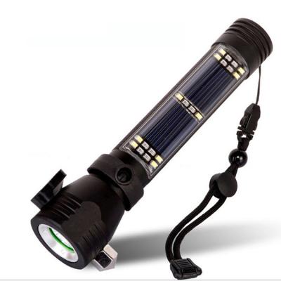 China Emergency Solar Power Multifunctional Flashlights With Safety Hammer Cutter Warning Light Rechargeable Emergency Torch Led Flashlight for sale