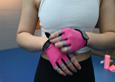 China Pink lightweight half-finger workout gloves offer comfort and grip during weightlifting sessions. for sale