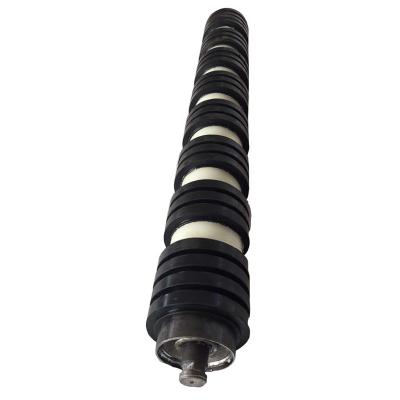 China Heavy Duty Rubber Oil Disc Return Roller Spiral Rollers For Conveyor Belt Use for sale