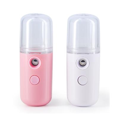 China Mini Atomizing Water Replenisher Mini Atomizing Water Replenisher Hydrate Beauty Instrument Handheld Nano Skin Facial Moisturizer Facial Humidifier 90*40*40mm for sale