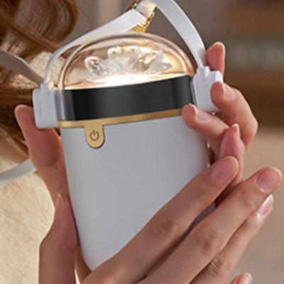 China Portable Electronic Display 5000 mA Hotel Battery Oval Electric Hand Warmer for sale