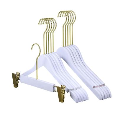 China Custom Made Cheap Durable White Gold Cloth Wood Finish Inspring Hangers for sale