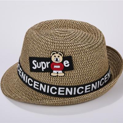 China Small Bear Decoration Beach Baby Kids Striped Summer Straw Hat for sale