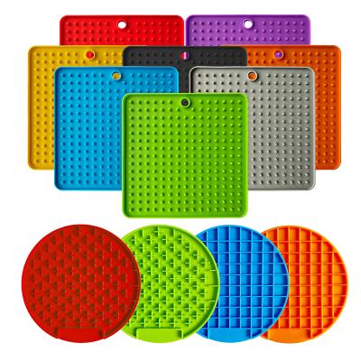 China Newest Sustainable Pet Bowl Silicone Dog Food Lick Pad Dog Slow Feeders Treat Dispensing Mat Dog Slow Food Bowls for sale