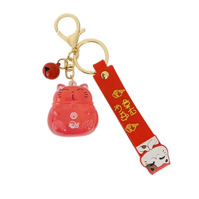 China Fashion Global Creative Cute Acrylic Plutus Cat Transparent Floating Bottle Liquid Key Chain Doll Keychain Bag Pendant for sale