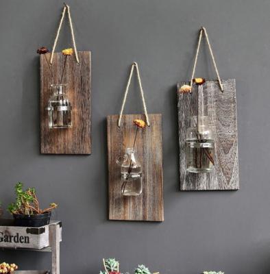 China Eco-Freindly Wooden Board Wall Hanging Plant Glass Bottle Country Decor Artificial Plants for sale