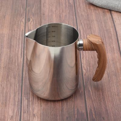 China Sustainable Milk Frothing Pitcher Coffee Milk Jug Stainless Steel Garland Cup With Measuring Scale Coffee Brewing Jug With Handle for sale