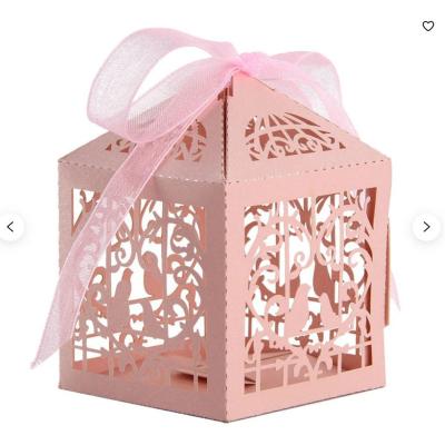 China Recycled Materials Customized Colors Like Birds Laser Cut Box Pearl Paper Candy Box Packaging for sale