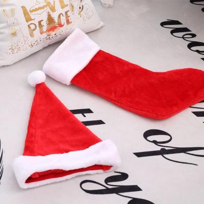 China Santa Socks Gift Bag Eco-friendly Xmas Storing Christmas Gift Bag For Kids Tree Decorations for sale