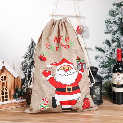 China Canvas Santa Sack Drawstring Large Christmas Gift Bag Festival Decoration Pick Xmas Sack Bag for Holiday Decorations for sale