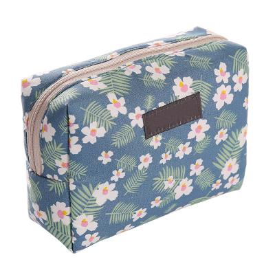 China Fashion Small Match With Single Bag Travel Wash Storage Bag Floral Lipstick Cotton Makeup Bag for sale