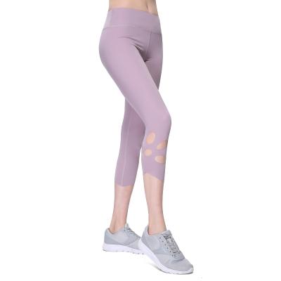 China New European and American Women's Breathable High Waist Hole Seven Points Fitness Sports Pants Naked Yoga Pants for sale