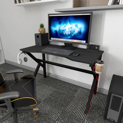 China Professional Design (Height)Adjustable Gaming Computer Desk Table With Multi Colored Led Lights And Cup Holder for sale